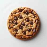 Chocolate chip cookie isolated on white background with shadow. Chocolate chip cookie top view. Cookie and dough with chocolate pieces flat lay photo