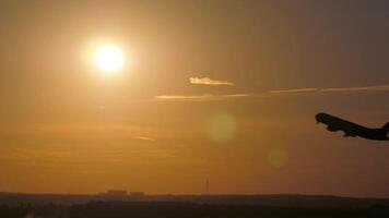 Aircraft taking off against the sun 4k background video