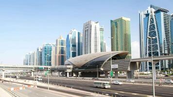 Dubai train station and highway with fast traffic 4k background video