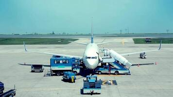 Airplane being prepared for a trip at the airport 4k background video