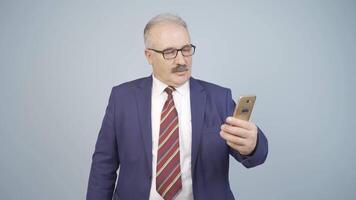 of businessman making call on phone. video