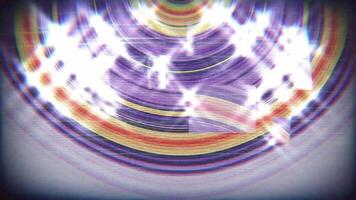 a circular image with a rainbow colored background video