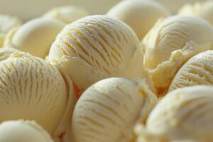 Close up of multiple scoops of creamy vanilla ice cream, ideal for summer treats and dessert recipes concepts photo