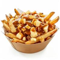 Canadian poutine with cheese curds and gravy isolated on white background photo