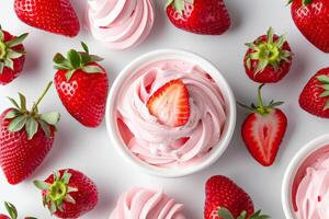 Fresh strawberries and strawberry flavored meringue swirls on a white background, ideal for Valentines Day and summer dessert themes photo