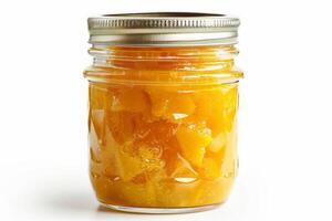 Mason jar of vibrant orange mango chutney, sweet and tangy, isolated against a white background photo