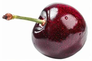 Close up of a single cherry with a glossy finish, isolated on a white background photo