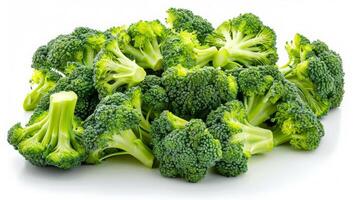 Wide angle of vibrant green broccoli florets isolated on white background photo