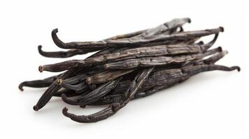 A pile of vanilla pods stacked over each other, isolated on white background photo