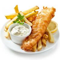 British fish and chips with tartar sauce isolated on a white background photo