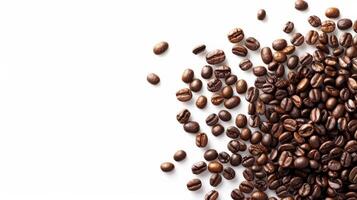 Top view of scattered coffee beans, isolated on a white background with space for text photo
