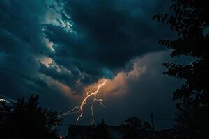 Scary bright electric lightning bolt with branches in the night dark sky photo