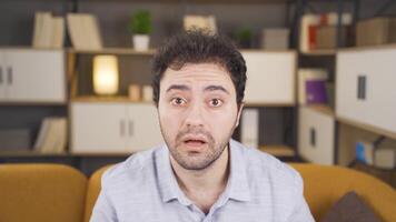 Frustrated man looking at camera. video