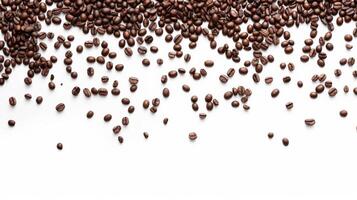 Top view of scattered coffee beans, isolated on a white background with space for text photo