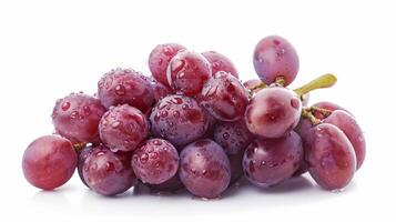 A cluster of ripe red grapes with dew, isolated on a white background photo