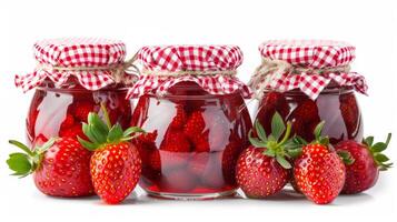 homemade strawberry jam jar, gingham lids, isolated on a white background photo