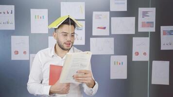 Researcher businessman who loves to read video