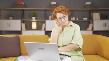 Woman coming up with idea in home office video