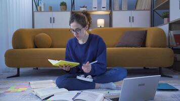 Young girl studying at home. video