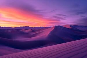 Sunrise paints unusual fractal patterns on undulating desert sand dunes with a vibrant orange and purple gradient sky as backdrop photo