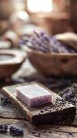 handcrafted lavender soap displayed on rustic wooden table, early morning market light, empty space for text photo