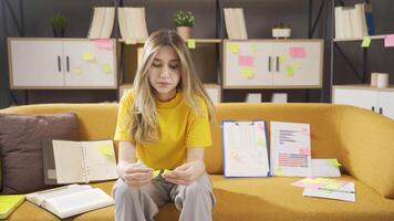 Forgetfulness, female student studying. video