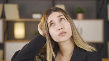 Portrait of woman coming up with idea. video