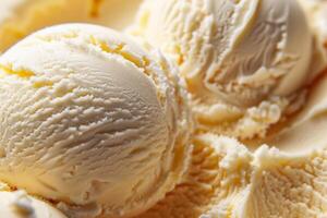 Close up of creamy vanilla ice cream scoops, perfect for summer treats, dessert recipes, and National Ice Cream Day content photo