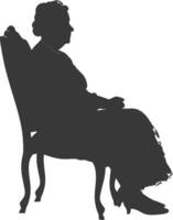 Silhouette elderly woman sitting in the chair black color only vector