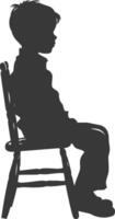 Silhouette little boy sitting in the chair black color only vector