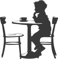 silueta pequeño chico sentado a un mesa en el café negro color solamente vector
