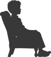 Silhouette little boy sitting in the chair black color only vector