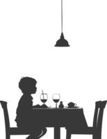 Silhouette little boy sitting at a table in the cafe black color only vector