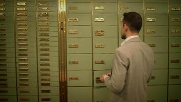 Businessman Entering Bank Safe Vault Room Storing Silver Bullion Inside Deposit video