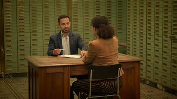 Sales Agent Talking to Customer Inside Safe Vault Room Explaining Deposit video