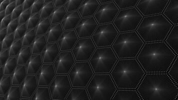 A close up of a black honeycomb pattern on a wall in electric blue font video