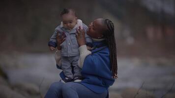 Mother Holding Young Baby Child Boy Outside Enjoying Family Life video