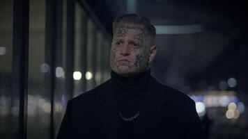 Intimidating Maverick Rebel Man with Head and Face Tattoos in Provoking Style video