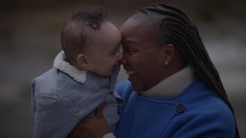 Mother Holding Young Baby Child Boy Outside Enjoying Family Life video