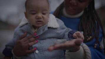 Mother Holding Young Baby Child Boy Outside Enjoying Family Life video