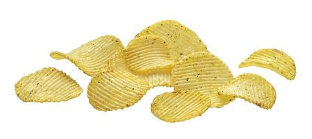 Ridged potato chips isolated on white background photo