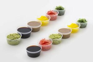 Sushi spices in small bowl isolated photo