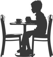 silueta pequeño chico sentado a un mesa en el café negro color solamente vector