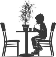 silueta pequeño chico sentado a un mesa en el café negro color solamente vector