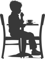 Silhouette little boy sitting at a table in the cafe black color only vector