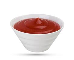 Ketchup bowl on white photo