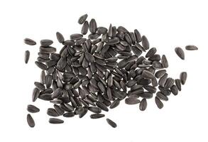 Black sunflower seeds isolated on white photo