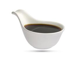 Dish of soy sauce isolated on white photo