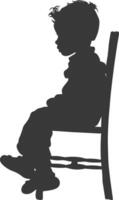 Silhouette little boy sitting in the chair black color only vector