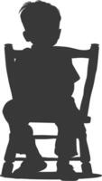 Silhouette little boy sitting in the chair black color only vector